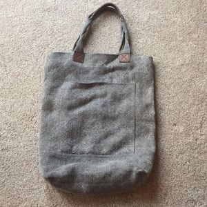 Large tote bag with front pocket.